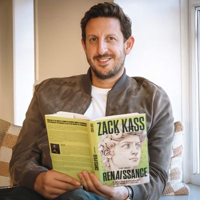 large-zack-kass-w-book-400.jpg